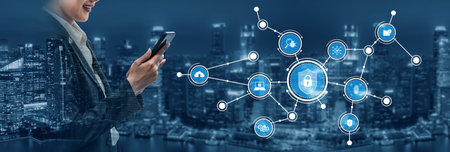 A businesswoman engages with her smartphone, surrounded by digital security icons, illustrating the...