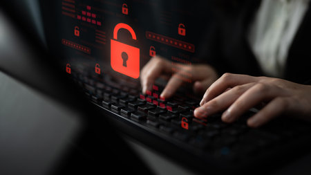 Digital security concept illustrating a cybersecurity breach, with a red unlocked padlock indicating...