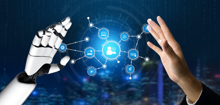 This image showcases the collaboration between human and robot hands, symbolizing the integration of...