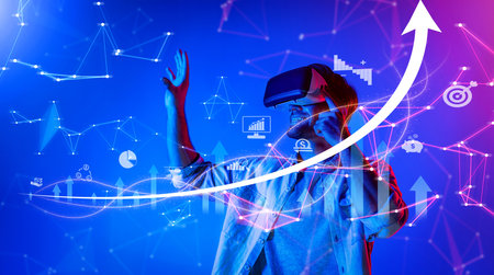 A business professional engages with virtual reality technology to analyze growth strategies and...