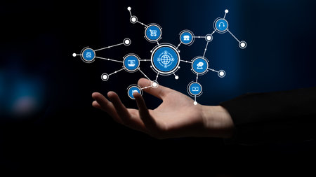 A hand reaches out toward a visual representation of a digital network, showcasing various icons...