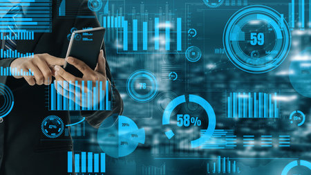 A business professional engages with a smartphone while surrounded by digital graphs and metrics...