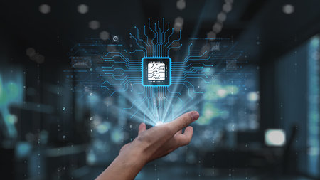 A hand holds a digital microchip surrounded by circuit patterns, representing cutting-edge...
