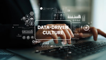 Hands Typing on Keyboard with Data-Driven Culture Concept Overlays Featuring Graphs and Analytics...