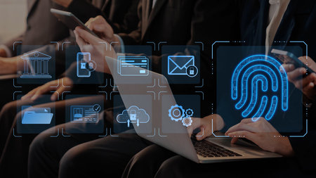 This image highlights modern technology in a corporate environment, showcasing digital solutions for security, communication, and efficient data management. Rasterの写真素材