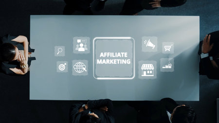 Business professionals are gathered around a sleek conference table discussing affiliate marketing strategies using digital visuals and icons for collaboration and innovation. Rasterの写真素材