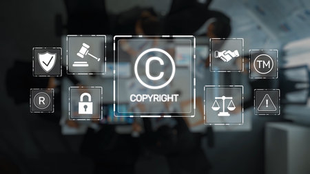 Explore the concepts of copyright and intellectual property in a modern office setting, highlighting legal symbols related to protection and professional collaboration. Rasterの写真素材