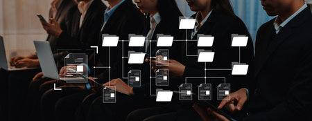 This image captures business professionals engaged in document management using various devices in a corporate setting, showcasing modern technology and collaboration.の写真素材