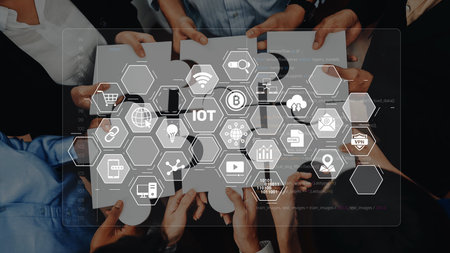 A diverse group of individuals collaborating enthusiastically on a digital project, surrounded by technology icons representing innovation and modern business trends. Rasterの写真素材