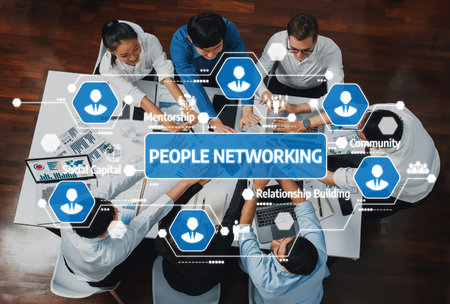 Captivating scene of professionals engaged in networking activities, emphasizing collaboration and mentorship in a modern office environment, fostering relationships and growth.の写真素材