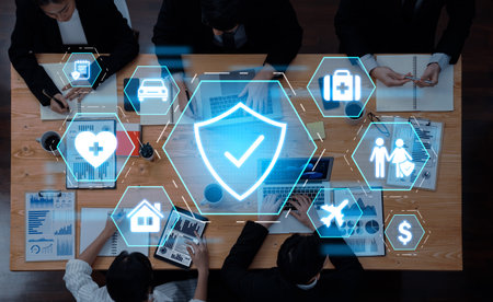 A group of professionals collaborates in a modern office while digital security icons overlay the...