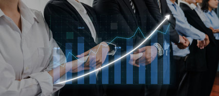 Group of business professionals showcases collaboration and success in finance with a backdrop of a growing graph signifying positive trends and achievements.の写真素材