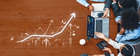 A team of professionals engages in collaborative analysis of financial data, showcasing various...