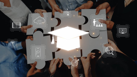 A diverse group of hands holds puzzle pieces, symbolizing the connection between education and...
