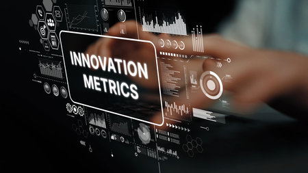 Hands Interacting with Innovation Metrics Display Featuring Data Visualizations and Analytical Charts in a Modern Digital Environment. Asymptotic smart data analytic.の写真素材