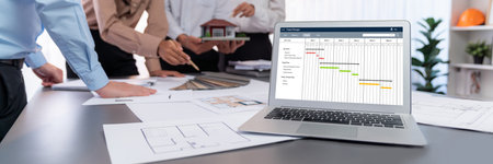 Project planning software for brisk business project management on the computer screen showing...