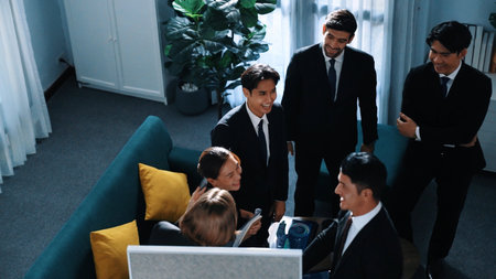 Top view of professional businessman present startup project and shake hand with diverse investor while clapping hands to celebrate and congratulate successful agreement at meeting room. Directorate.の写真素材