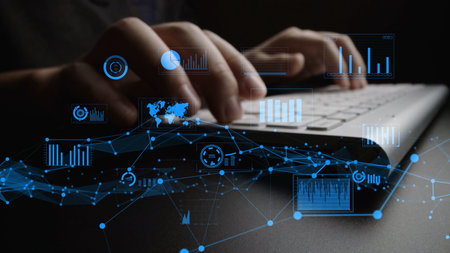 This image captures hands typing on a keyboard, surrounded by dynamic digital elements, illustrating...