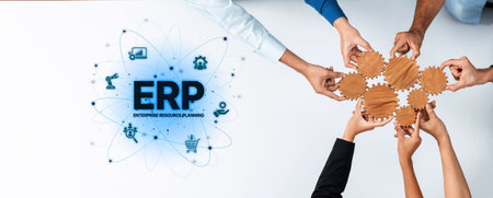 Hands unite to assemble interconnected gears, illustrating the concept of ERP in a collaborative business setting, emphasizing teamwork and innovation.の写真素材