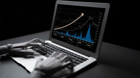 A robotic hand interacts with a laptop, showcasing a data analytics graph with an upward trend. This image captures the intersection of technology and automation in business.の写真素材