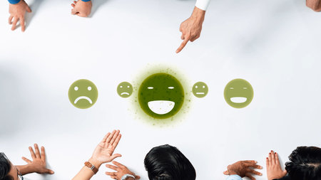 A diverse team engages in a discussion, showcasing various emotions on a white table. This image captures the essence of collaboration and understanding in a professional setting. Rasterの写真素材