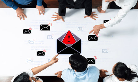 A cybersecurity alert indicating a phishing scam or malware threat. This dangerous email requires immediate action to protect against data theft and unauthorized system access.の写真素材