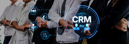A group of diverse professionals collaborates in a modern office setting, showcasing CRM technology...