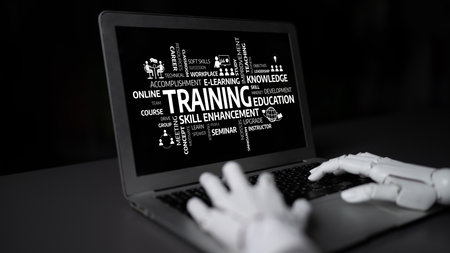 A conceptual image featuring a robotic hand using a laptop, symbolizing the intersection of technology and education in modern training and skill enhancement. Tesselの写真素材