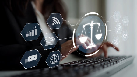 Futuristic digital law interface displaying justice scale, highlighting digital law, AI compliance, digital law systems, and digital law regulations for secure governance.の写真素材