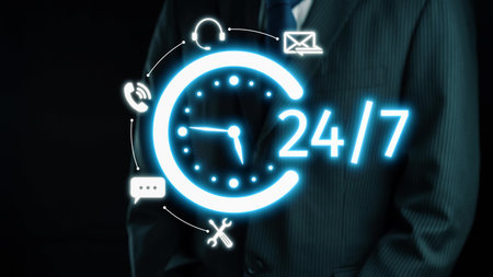 A professional businessman stands with a digital clock icon representing 24 hour availability, emphasizing the importance of communication in a modern business environment.の写真素材