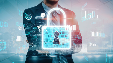 A businessman in a suit stands confidently in front of digital graphics representing cyber security, emphasizing data protection in a modern urban environment.の写真素材