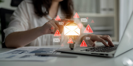 Concept of a cybersecurity warning for unsafe email communication. This alert signifies a phishing attack, spam, or malware risk that requires immediate attention to prevent fraud.の写真素材