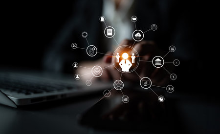 A concept of centralized business management and corporate strategy. A leadership team connecting to all functions like finance, operations, and planning. Motifの写真素材