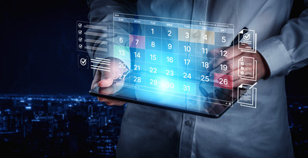 A digital calendar interface for business planning and organization. Used for scheduling events, managing tasks with checklists, and tracking important deadlines.の写真素材