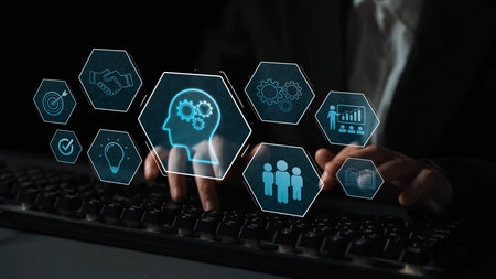 Head with gear and icons representing learning, digital training, and development process, showing...
