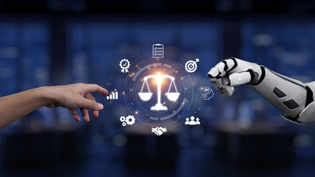 A captivating image featuring a human hand and a robotic hand approaching a glowing scale of justice. This visual represents the intersection of law and technology.の写真素材