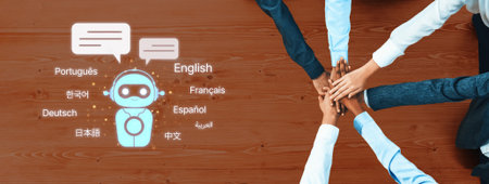 Hands gathered together on a wooden table, symbolizing collaboration, accompanied by a multilingual chatbot graphic representing global communication in a modern office environment.の写真素材