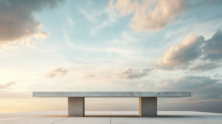A minimalist concrete bench sits elegantly against a dramatic sky filled with clouds. The scene conveys tranquility and modern design in an outdoor setting.の素材