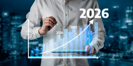A business professional reviews financial growth projections from 2023 to 2026, illustrating data...
