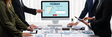 Panorama shot analyst team utilizing BI Fintech to analyze financial report with laptop. Businesspeople analyzing BI data dashboard displayed on laptop screen for business insight. Prodigyの写真素材