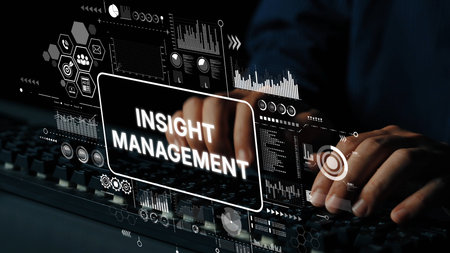 Hands on keyboard with digital interfaces showing data analysis concepts and insight management for business enhancement. Asymptotic smart data analytic.の写真素材