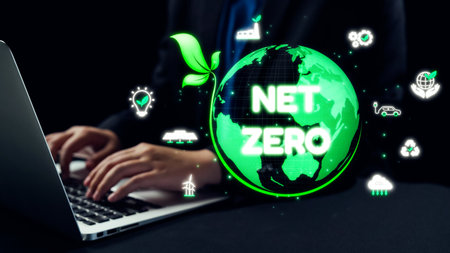 A captivating digital design showcasing the net zero concept through a green earth surrounded by technology symbols, emphasizing sustainability and environmental responsibility in business.の写真素材
