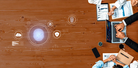A diverse business team collaborates on security strategies using fingerprint authentication and...