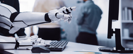 A robotic hand gestures over a keyboard, illustrating the blend of technology and human interaction...