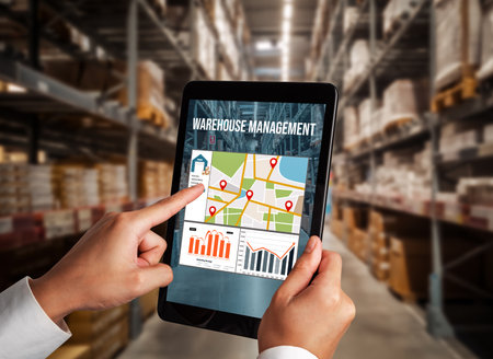 Warehouse management innovative software in computer for real time monitoring of goods package delivery . Computer screen showing smart inventory dashboard for storage and supply chain distribution .の写真素材