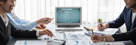 Business intelligence and data analysis concept. Analyst team working on financial data analysis dashboard on laptop screen as marketing indication for effective business strategic planning. Insightの写真素材