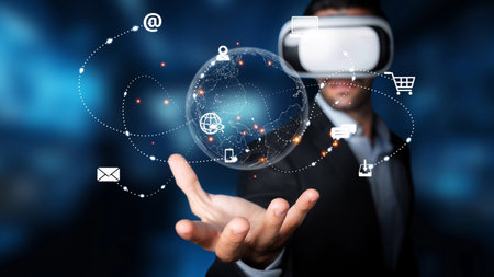 A person using virtual reality technology interacts with digital icons symbolizing online communication and e-commerce in a modern environment. Rasterの写真素材