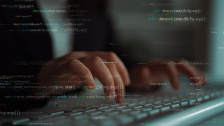 A focused programmer works on a keyboard, surrounded by floating lines of code, illustrating the...