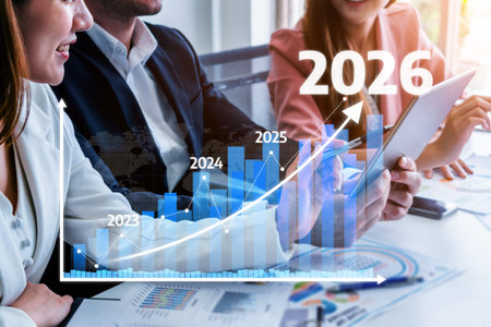 A business team engages in a strategic meeting, analyzing growth projections from 2023 to 2026, with...