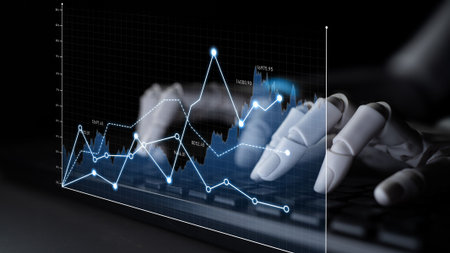 A robotic hand interacts with a keyboard while analyzing financial graphs and charts. This futuristic scene captures the essence of technology in data analysis and investment strategies.の写真素材